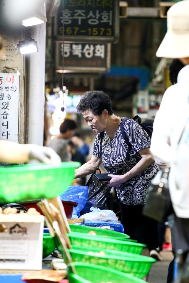 A shopper browses goods at Kyungdong Market in Dongdaemun-gu Seoul on Sept 13 2024 AJP Kim Dong-woo