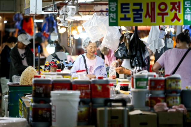 A shopper browses goods at Kyungdong Market in Dongdaemun-gu Seoul on Sept 13 2024 AJP Kim Dong-woo