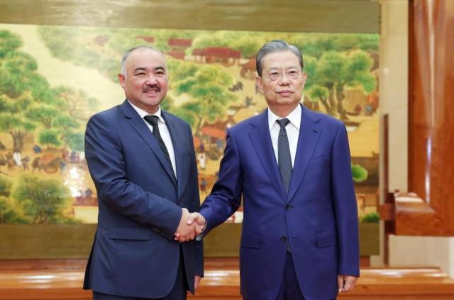 Zhao Leji Chairman of the Standing Committee of the National Peoples Congress NPC shakes hands with Kyrgyz Parliament Speaker Nurlanbek Shakiev in Beijing China on September 13 2024 Xinhua-Yonhap