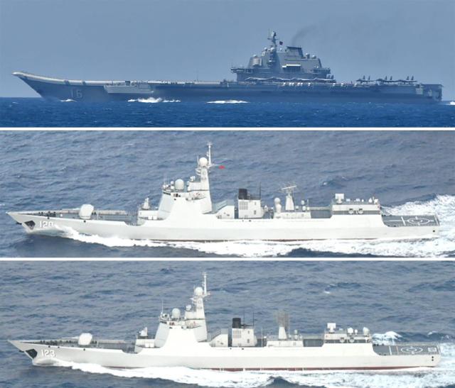 This photo shows Chinese aircraft carrier Liaoning top and two Luyang III-class missile destroyers number 120 at centre and number 123 at bottom at sea in waters near Japans southern Okinawa region Sept 18 2024 Courtesy of Japans Ministry of Defense Joint Staff Office Public Relations AFP - Yonhap