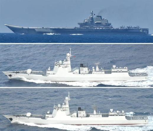 Chinese carrier sails near Japanese islands, raising tensions