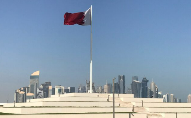 The Qatari flag blows in the wind at a park in Doha Qatar in this photo taken on February 17 2018 REUTERS-Yonhap