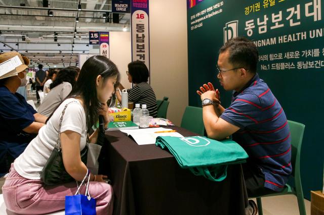 A student receives admission counseling at the 2025 College Rolling Admission Fair at COEX in Seoul on Sept 20 2024 AJP Kim Dong-woo