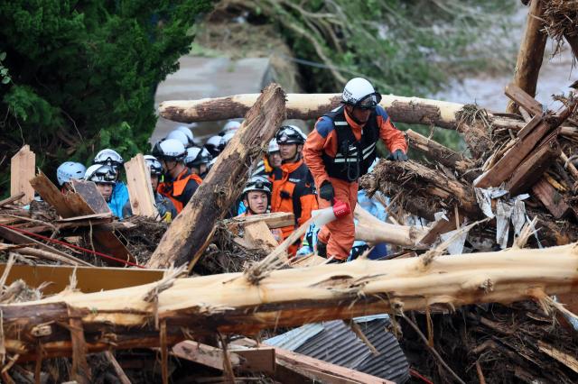 Firefighters searching for missing persons among debris in Ishikawa Prefecture Japan Sept 22 2024 EPAJIJI PRESS-Yonhap