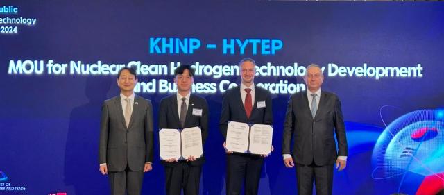 This photo shows from left Koreas Minister of Trade Industry and Energy Ahn Duk-geun head of Korea Hydro  Nuclear Power KHNPs H₂ Smart Business Department Kong Young-gon chairman of Czech Hydrogen Technology Platform HYTEP Aleš Doucek Czechs Minister of Industry and Trade Jozef Síkela posing for a photo for the MOU of KHNP and HYTEP in Prague Czech Sept 20 2024 Courtesy of KHNP