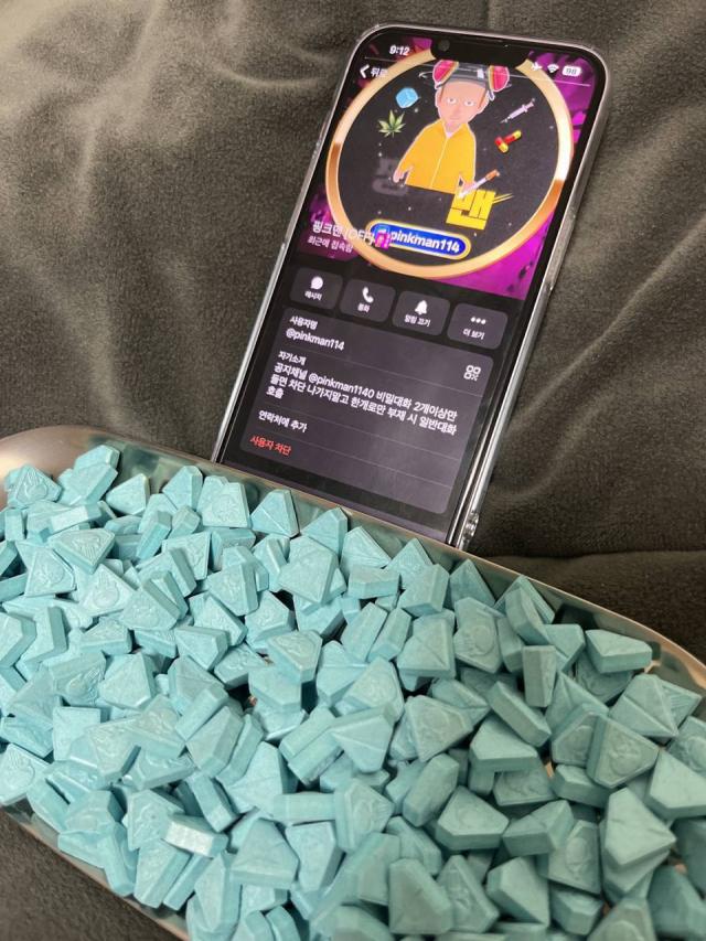 This photo shows blue candy-like hallucinatory drugs sold discretely on Telegram Sept 12 2024 AJP