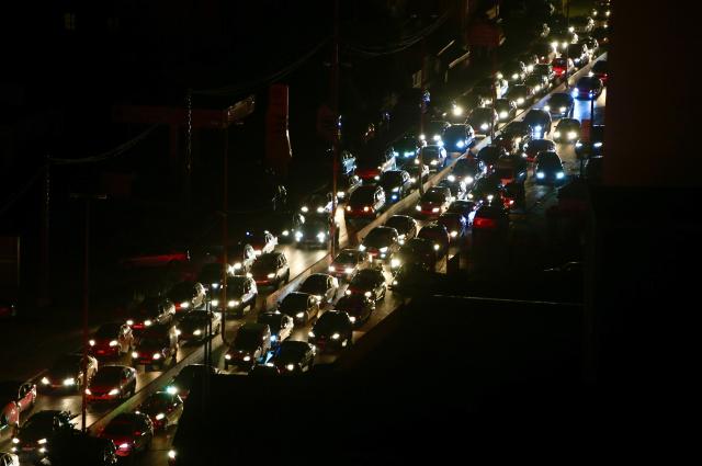 Lebanese people evacuate in their cars from southern Lebanon towards Sidon and Beirut 23 Sept 2024 EPA-Yonhap