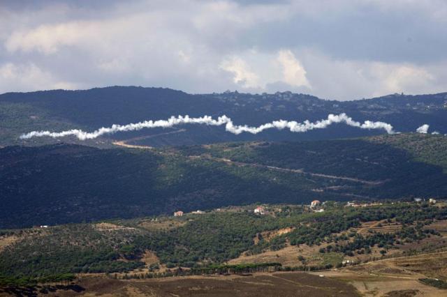 The smoke trail from a Hezbollah rocket is visible from the southern Lebanese town of Marjayoun on Sept 21 2024 AP-Yonhap