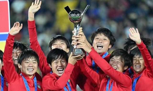 North Koreas female soccer players lift the trophy at the FIFA U-20 Womens World Cup at Nemesio Camacho El Campín Stadium in Colombia on September 23 2024 AFP-Yonhap