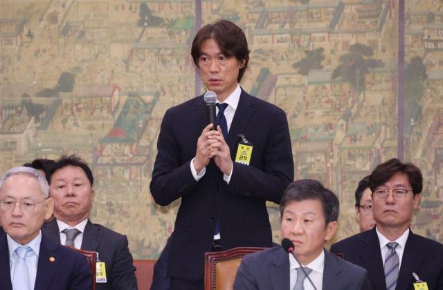 Hong Myung-bo center head coach of the Korean mens national football team answers a question at the National Assembly in Seoul on Sept 24 2024 Yonhap