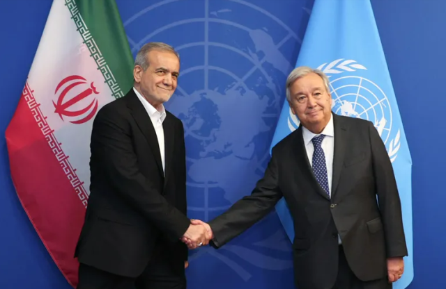 
President Masoud Pezeshkian left exchanges greetings with UN Secretary-General Antonio Guterres right in New York US on Sept 23 2024 AP-Yonhap