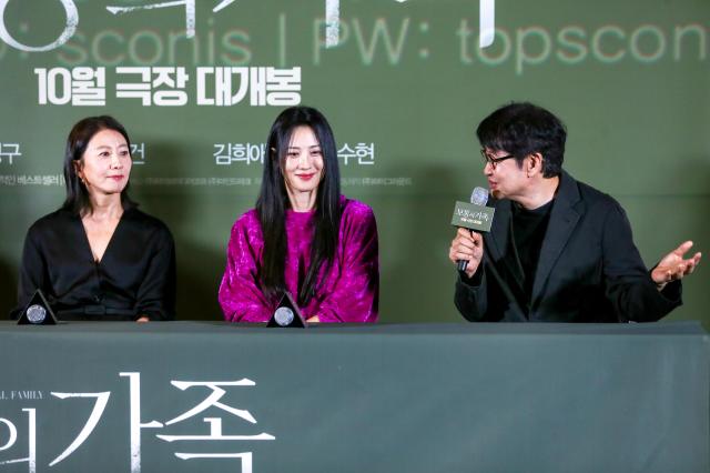 Director Hur Jin-ho right speaks during a press conference for A Normal Family at CGV Yongsan IPark Mall in Seoul on Sept 24 2024