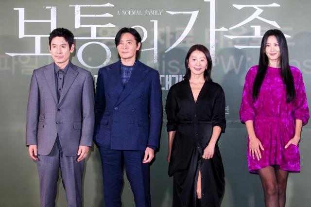 Cast members pose for a photo during a press conference conference for A Normal Family at CGV Yongsan IPark Mall in Seoul on Sept 24 2024 AJP Kim Dong-woo