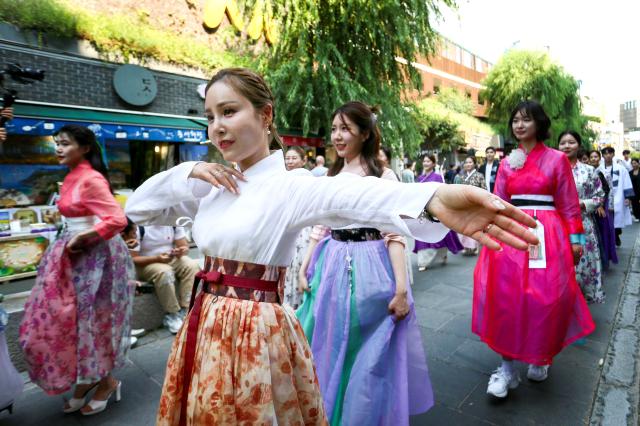 Participants in hanbok parade during the 2024 Insadong Antique  Art Fair in Insadong Jongno-gu Seoul on Sept 26 2024 AJP Kim Dong-woo