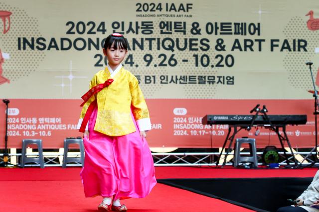 A hanbok fashion show takes place during the opening ceremony of the 2024 Insadong Antique  Art Fair in Insadong Jongno-gu Seoul on Sept 26 2024 AJP Kim Dong-woo