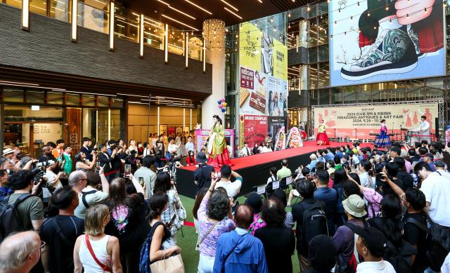 A hanbok fashion show takes place during the opening ceremony of the 2024 Insadong Antique  Art Fair in Insadong Jongno-gu Seoul on Sept 26 2024 AJP Kim Dong-woo