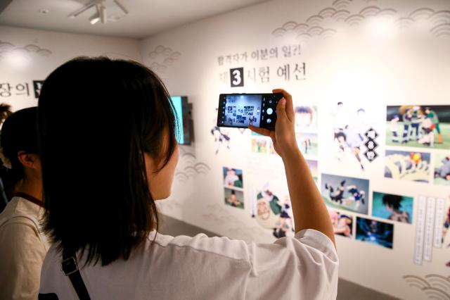 A visitor takes a photo at Naruto The Gallery held in Mapo-gu Seoul on Sept 27 2024 AJP Kim Dong-woo