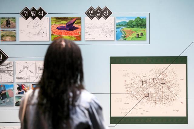 A visitor examines a display at Naruto The Gallery held in Mapo-gu Seoul on Sept 27 2024 AJP Kim Dong-woo