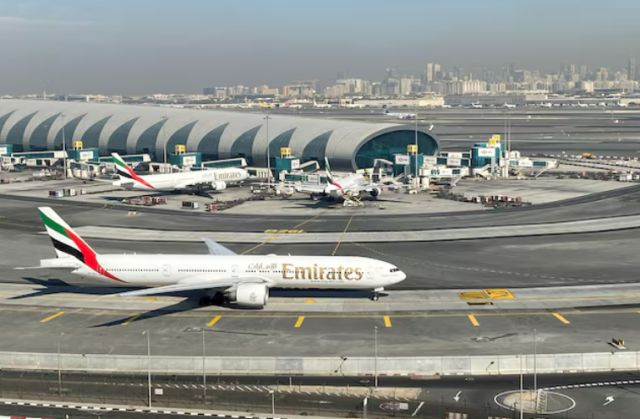 Emirates planes are seen in Dubai International Airport United Arab Emirates on Jan 13 2021 REUTERS-Yonhap