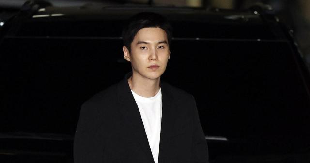 Suga of BTS appears for questioning regarding allegations of driving an electric scooter while intoxicatedat Yongsan Police Station in Seoul on August 23 2024 Yonhap





