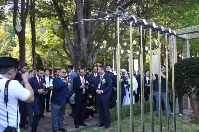 Visitors look at a sculpture during an event on Nami Island Gangwon Province on Sept 27 2024 AJP Han Jun-gu