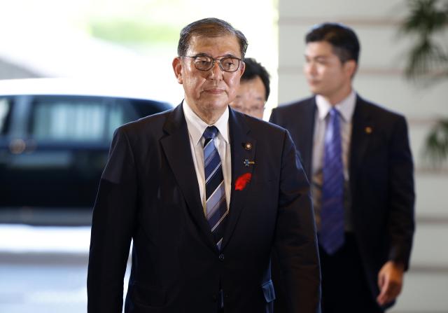 Newly elected Japanese Prime Minister Shigeru Ishiba arrives at the prime ministers office in Tokyo Oct 1 2024 EPA-Yonhap