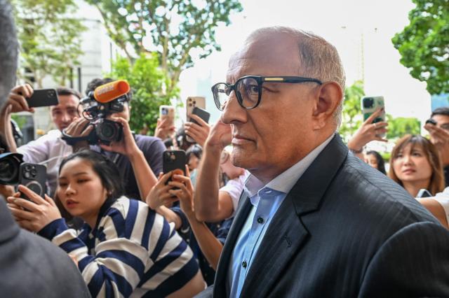 Singapores former Minister for Transport and Minister-in-charge for Trade Relations S Iswaran leaves the Supreme Court in Singapore on October 3 2024 AFP-Yonhap