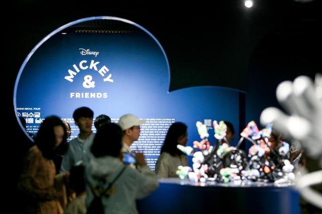 Visitors view the MickeyFriends Seoul Tour exhibition at Deoksugung Palace in Jung-gu Seoul on Oct 4 2024 AJP Kim Dong-woo