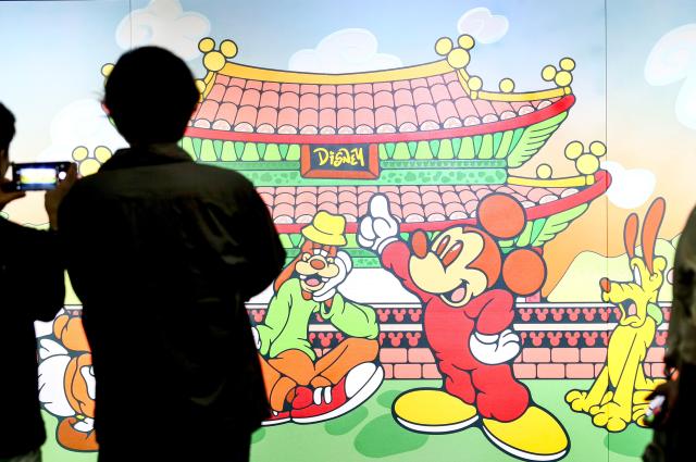 Visitors view the MickeyFriends Seoul Tour exhibition at Deoksugung Palace in Jung-gu Seoul on Oct 4 2024 AJP Kim Dong-woo