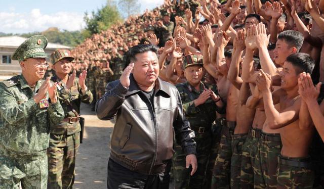 North Korean leader Kim Jong-un center inspects an army base at an undisclosed location on Oct 2 2024 in this photo released by the Norths official Korean Central News Agency two days later