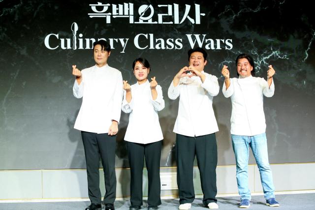 White Spoon team members From left Choi Hyun-seok Jung Ji-sun Jang Ho-joon and Edward Lee pose for a photo at the Culinary Class Wars press conference in Mapo-gu Seoul on Oct 7 2024 AJP Kim Dong-woo