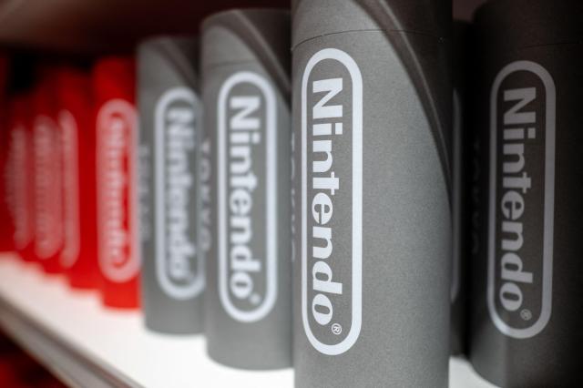 This photo shows Nintendo T-shirts on display at a Nintendo store in Shibuya Tokyo May 2 2024 AFP-Yonhap