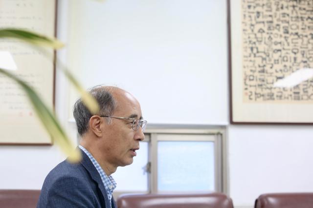 Kim Ju-won a professor emeritus at Seoul National University and president of the Korean Language Society speaks during an interview at his office on Sept 23 2024AJP Han Jun-gu