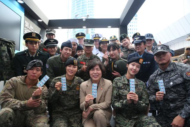 Minister Kang Jeong-ai center front row poses for a commemorative photo with veterans at the Military veterans week event at COEX in Seoul on Oct 8 2024 AJP Han Jun-gu