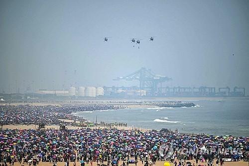 Indian Air Force IAF helicopters flew during an air show at Marina Beach in Chennai on Oct 6 2024 Yonhap