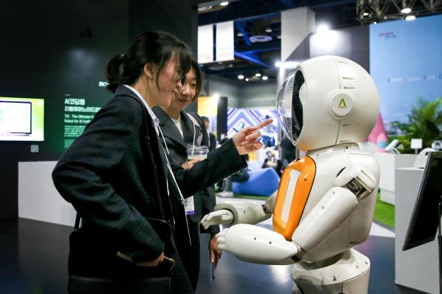 Visitors view exhibits at the Seoul Smart Life Week held at COEX in Seoul on Oct 11 2024 AJP Kim Dong-woo 