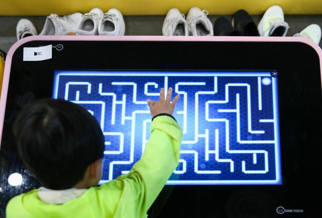 A child participates in a booth activity at the Seoul Smart Life Week held at COEX in Seoul on Oct 11 2024 AJP Kim Dong-woo