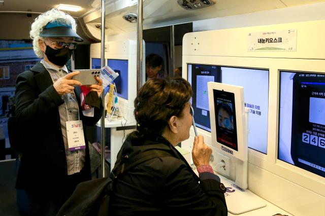 A visitor participates in a booth activity at the Seoul Smart Life Week held at COEX in Seoul on Oct 11 2024 AJP Kim Dong-woo