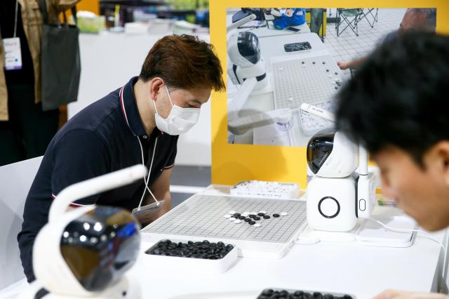 Visitors participate in booth activities at the Seoul Smart Life Week held at COEX in Seoul on Oct 11 2024 AJP Kim Dong-woo