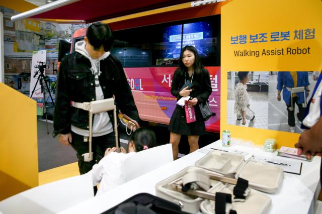 A visitor participates in a booth activity at the Seoul Smart Life Week held at COEX in Seoul on Oct 11 2024 AJP Kim Dong-woo