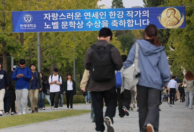 A banner congratulating author Han Kang on winning Nobel Prize in Literature is hung on the campus of Yonsei University where she studied on Oct 11 2024 Yonhap