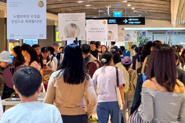 Kyobo Bookstore which holds banners celebrating the Noble Prize winning of Han Kang is crowded with visitors in Seoul on Oct 12 2024 AJP Kim Dong-woo