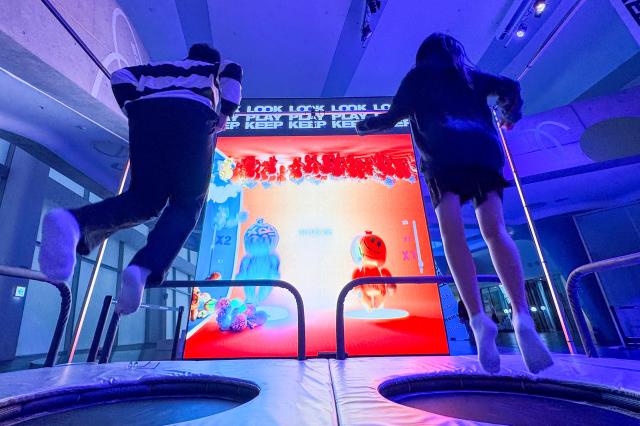 Visitors enjoy the Look Play Keep exhibition at Dongdaemun Design Plaza in Seoul on Oct 14 2024 AJP Kim Dong-woo