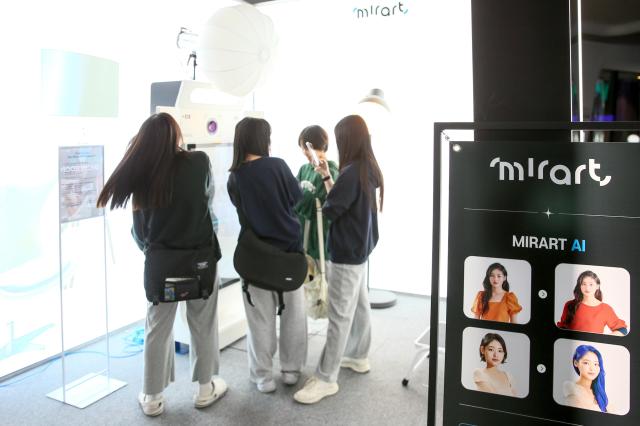 Visitors enjoy the Look Play Keep exhibition at Dongdaemun Design Plaza in Seoul on Oct 14 2024 AJP Kim Dong-woo