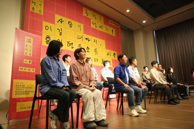 Same-sex couples sit at the press conference for a lawsuit seeking to legalize LGBT in Seoul on Oct 10 2024 AJP Han Jun-gu