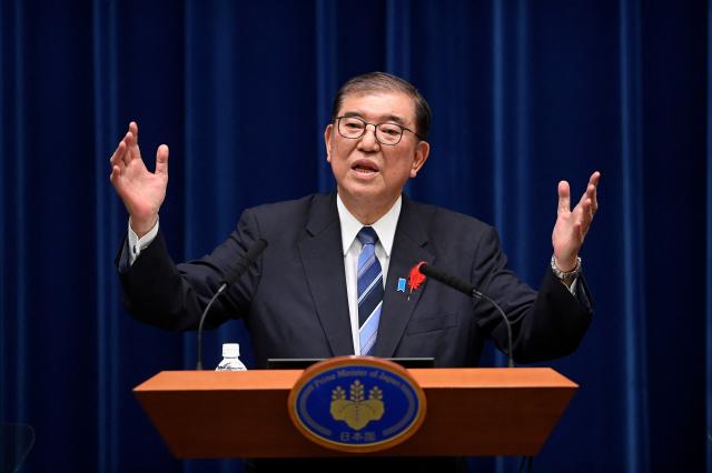 Japanese Prime Minister Shigeru Ishiba speaks during a joint news conference on Oct 9 2024 at his official residence in Tokyo Japan after dissolving the Lower House of Parliament and proceeding for an early election on Oct 27 Reuters-Yonhap