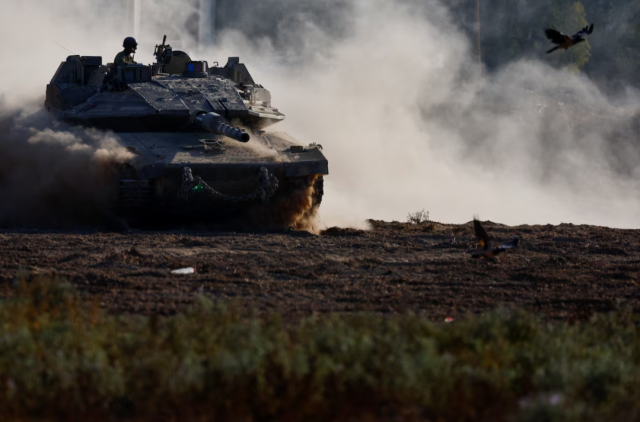 An Israeli tank moves near the Israel-Gaza border on Aug 14 2024 Reuters-Yonhap