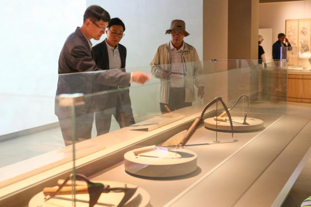 Visitors view the  The Beginning of K-Culture permanent exhibition at the National Folk Museum of Korea in Seoul on Oct 15 2024 AJP Kim Dong-woo