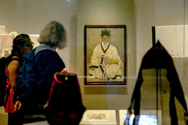 Visitors view the  The Beginning of K-Culture permanent exhibition at the National Folk Museum of Korea in Seoul on Oct 15 2024 AJP Kim Dong-woo