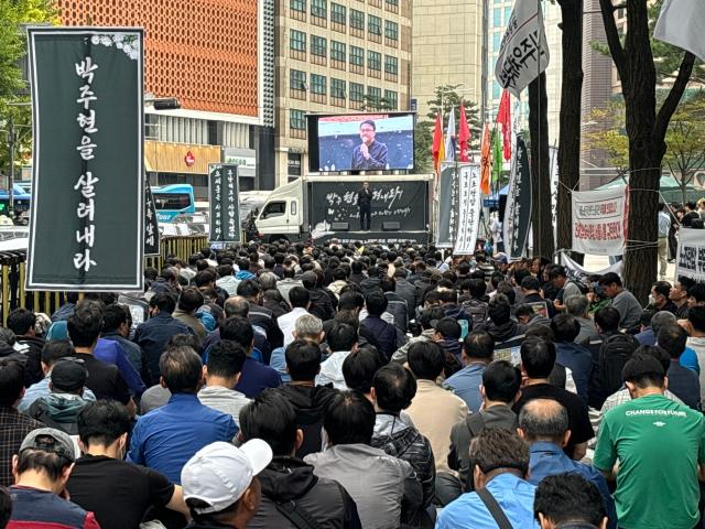 Seoul transit corporation labor union members participate in a rally and memorial service demanding an apology for a deceased worker near Seoul city hall Seoul on Oct 15 2024 AJP Han Jun-gu